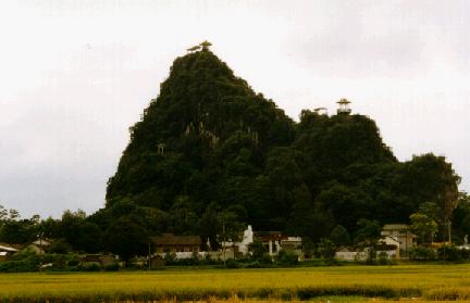 A typical China mountain-ette rising from a field